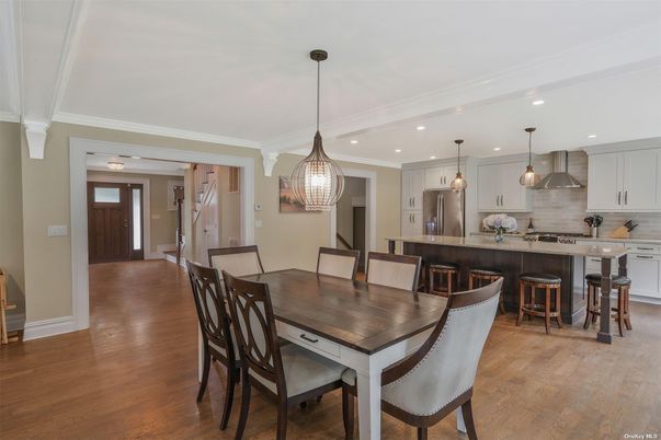 Dining room, Interior, Kitchen, Pendant Lights, Recessed Lighting, Stainless Steel Appliances, Wood Texture Flooring