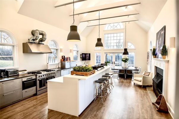 Dining room, Fireplace, Interior, Kitchen, Living room, Pendant Lights, Stainless Steel Appliances, Wood Texture Flooring