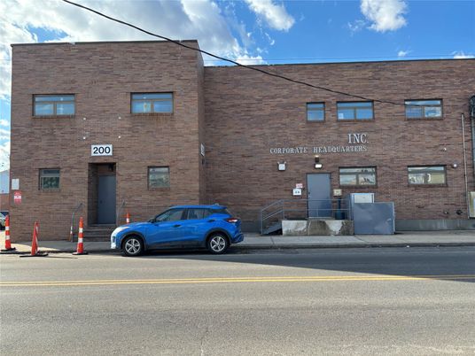 Exterior, Facade, Brick Facade, Condo Building