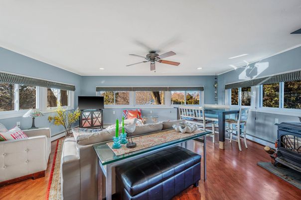Dining room, Fireplace, Interior, Living room, Recessed Lighting, Wood Texture Flooring