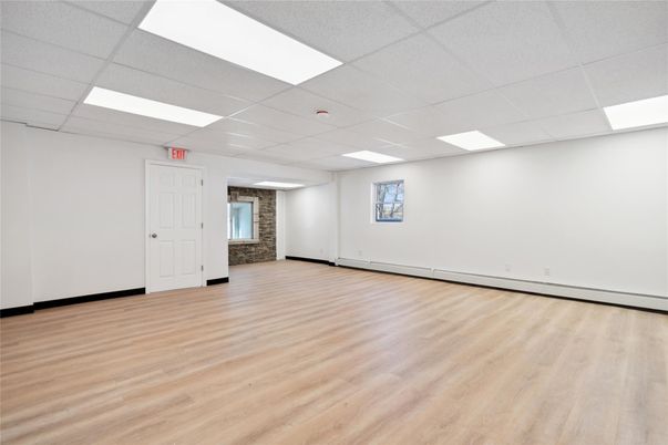 Empty room, Interior, Recessed Lighting, Stone Walls, Wood Texture Flooring