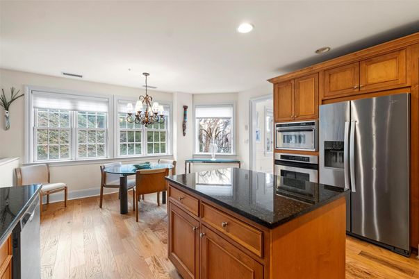 Chandelier, Dining room, Interior, Kitchen, Recessed Lighting, Stainless Steel Appliances, Wood Texture Flooring
