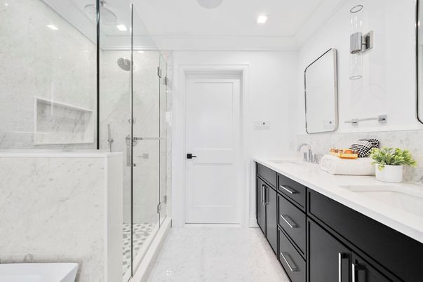 Bathroom, Dual Sink Vanities, Glass Shower, Interior, Marble, Marble Walls, Recessed Lighting