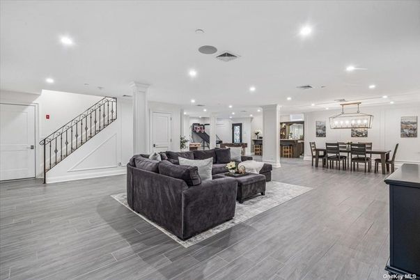 Dining room, Fireplace, Interior, Living room, Pendant Lights, Recessed Lighting, Wood Texture Flooring