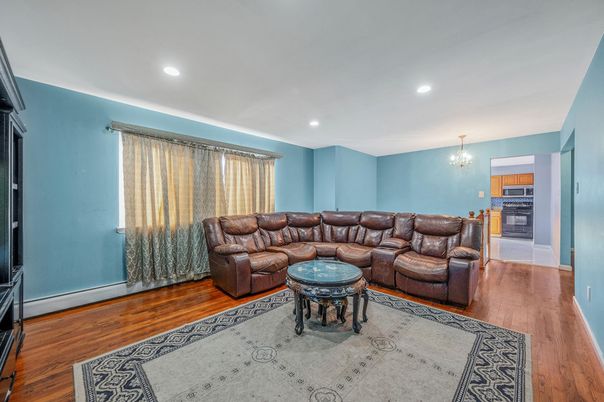 Chandelier, Fireplace, Interior, Living room, Recessed Lighting, Wood Texture Flooring