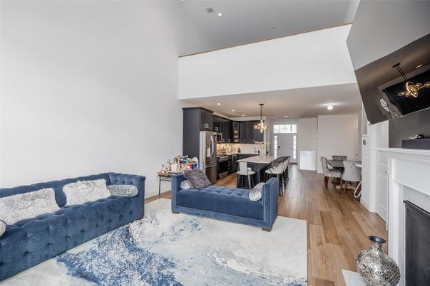 Dining room, Fireplace, Interior, Kitchen, Living room, Pendant Lights, Recessed Lighting, Stainless Steel Appliances, Wood Texture Flooring