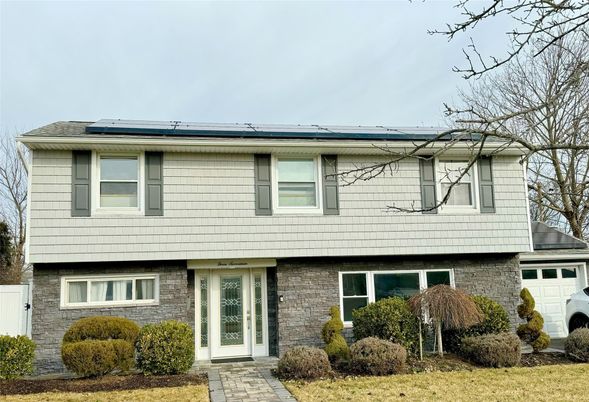 Attached, Exterior, Facade, Brick Facade, Solar Panels, Split Level