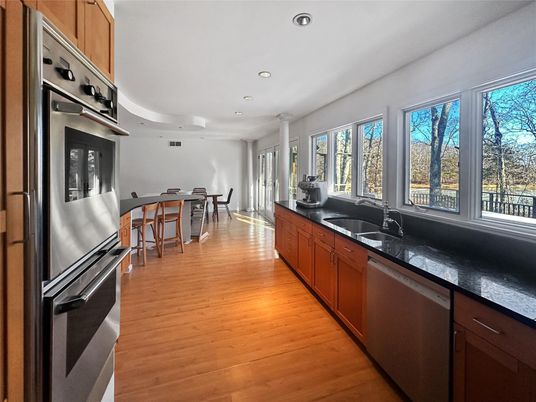 Dining room, Interior, Kitchen, Recessed Lighting, Stainless Steel Appliances, Wood Texture Flooring