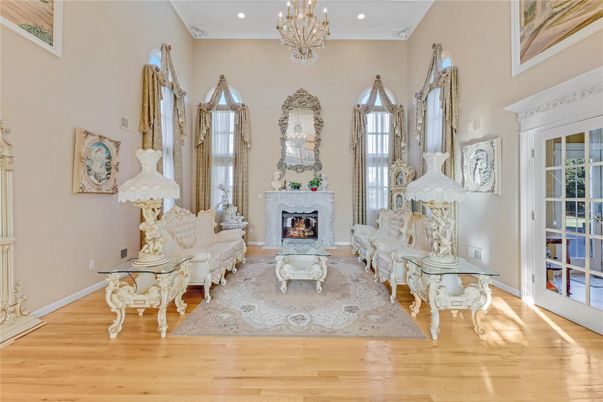 Chandelier, Fireplace, Interior, Living room, Recessed Lighting, Wood Texture Flooring