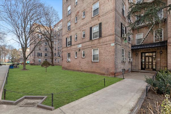 Backyard, Exterior, Facade, Brick Facade, Condo Building