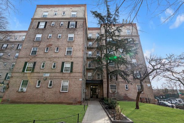 Exterior, Facade, Brick Facade, Condo Building