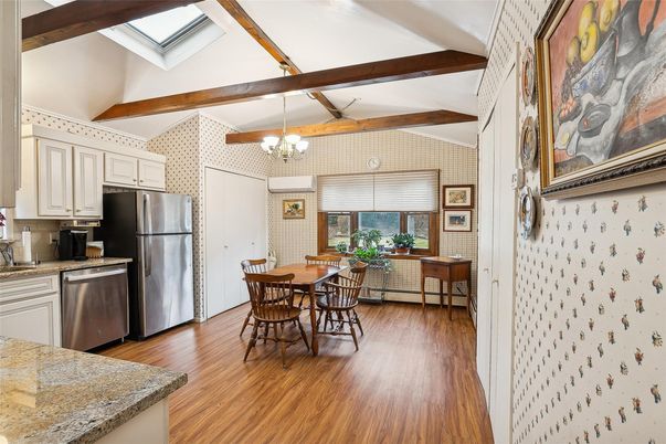 Chandelier, Dining room, Interior, Kitchen, Stainless Steel Appliances, Wooden Beams, Wood Texture Flooring