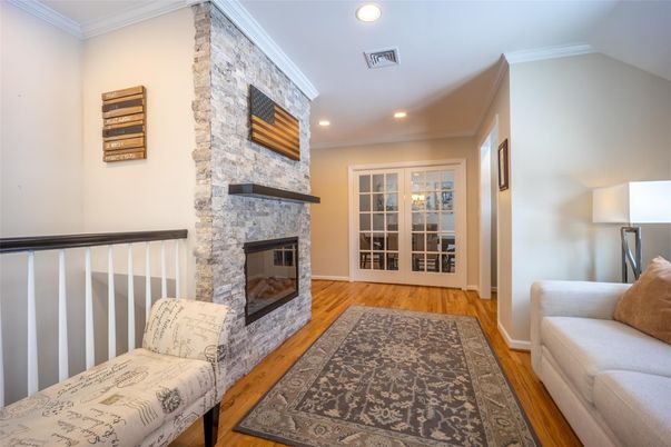 Fireplace, Interior, Recessed Lighting, Stone Walls, Wood Texture Flooring
