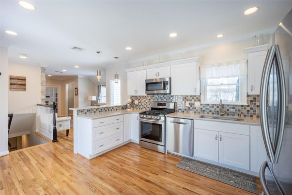 Interior, Kitchen, Pendant Lights, Recessed Lighting, Stainless Steel Appliances, Wood Texture Flooring