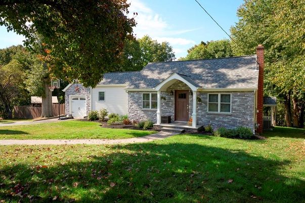 Attached, Backyard, Exterior, Facade, Brick Facade, Cape Cod