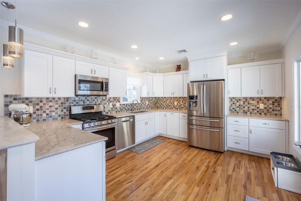 Interior, Kitchen, Pendant Lights, Recessed Lighting, Stainless Steel Appliances, Wood Texture Flooring