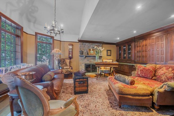 Chandelier, Fireplace, Interior, Living room, Pendant Lights, Piano, Recessed Lighting, Stone Walls