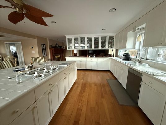 Interior, Kitchen, Recessed Lighting, Tile Countertops, Wood Texture Flooring