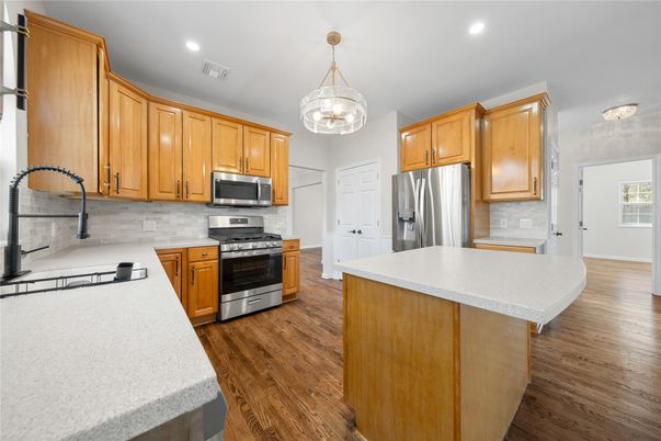 Interior, Kitchen, Recessed Lighting, Stainless Steel Appliances, Wood Texture Flooring