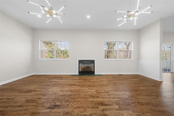 Empty room, Fireplace, Interior, Pendant Lights, Recessed Lighting, Wood Texture Flooring