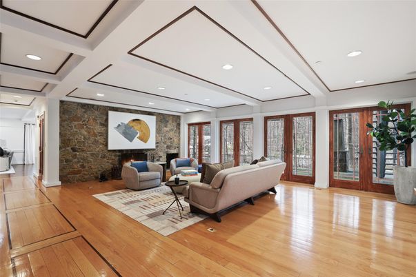 Fireplace, Interior, Living room, Recessed Lighting, Stone Walls, Wood Texture Flooring
