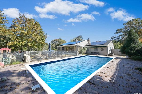 Exterior, Pool, Solar Panels