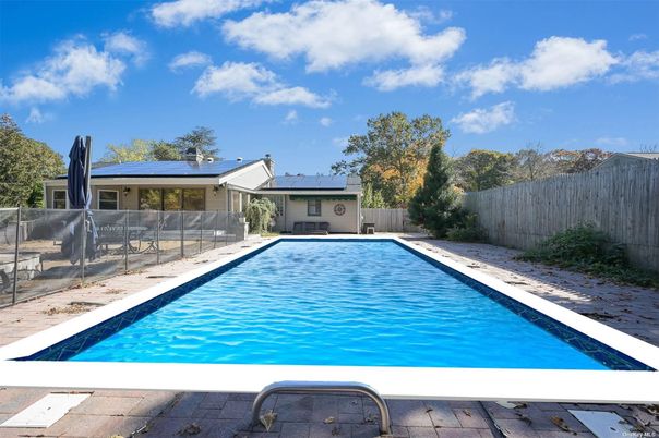 Exterior, Pool, Solar Panels