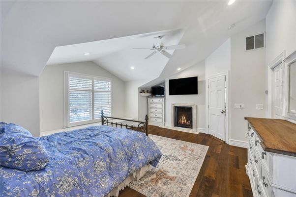 Bedroom, Fireplace, Interior, Recessed Lighting, Wood Texture Flooring