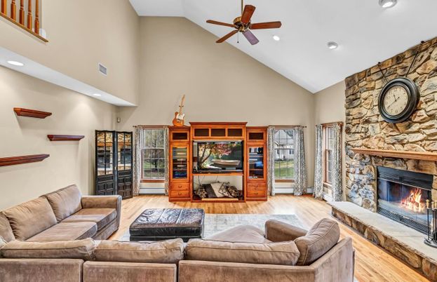 Fireplace, Interior, Living room, Recessed Lighting, Stone Walls, Wood Texture Flooring