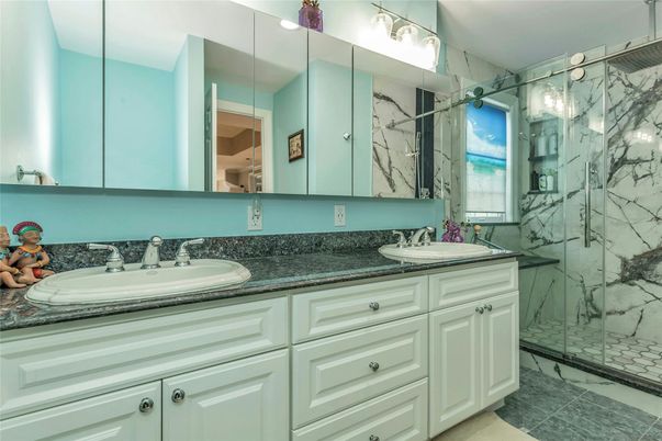Bathroom, Dual Sink Vanities, Glass Shower, Interior, Marble Walls