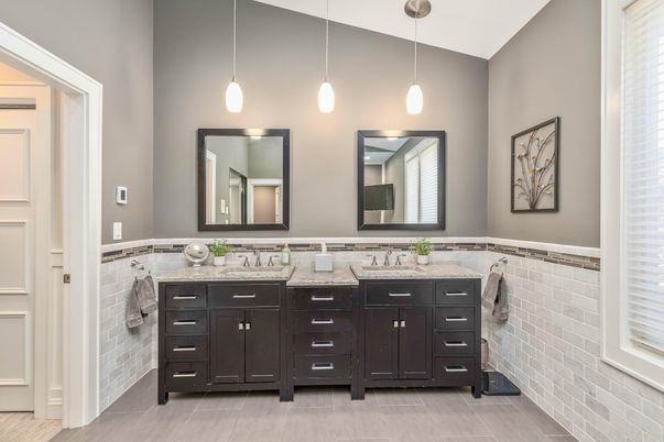Bathroom, Dual Sink Vanities, Interior, Pendant Lights, Stone Walls, Wood Texture Flooring