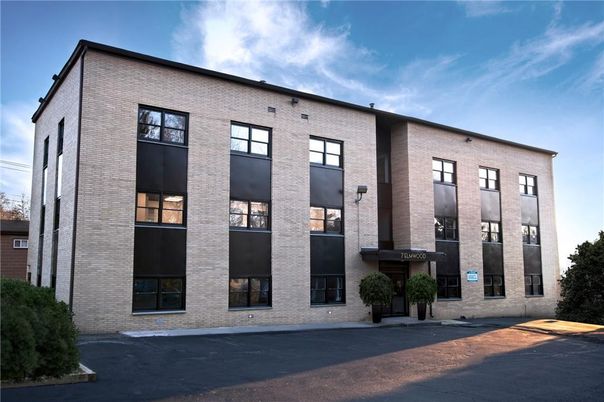 Exterior, Facade, Brick Facade, Condo Building