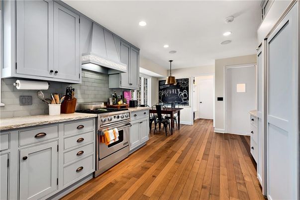 Dining room, Interior, Kitchen, Pendant Lights, Recessed Lighting, Stainless Steel Appliances, Wood Texture Flooring