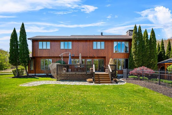 Backyard, Exterior, Facade, Brick Facade, Raised Ranch
