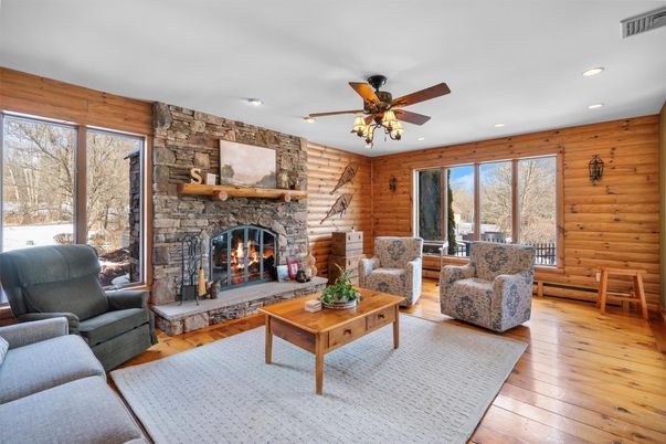 Fireplace, Interior, Living room, Recessed Lighting, Stone Walls, Wood Texture Flooring, Wooden Walls