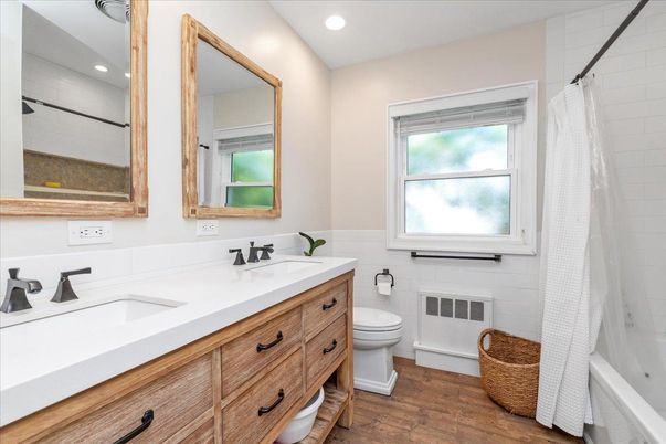 Bathroom, Dual Sink Vanities, Interior, Recessed Lighting, Wood Texture Flooring