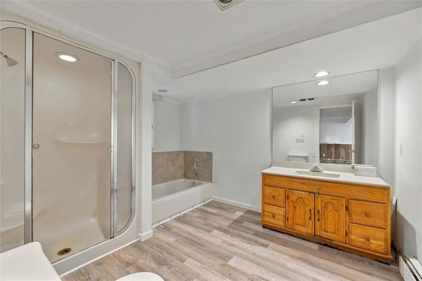 Bathroom, Glass Shower, Interior, Recessed Lighting, Wood Texture Flooring