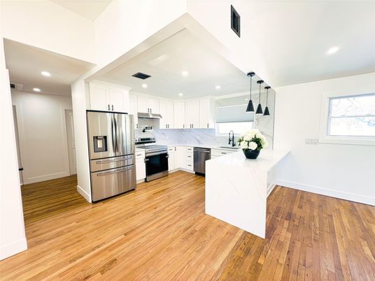 Interior, Kitchen, Pendant Lights, Recessed Lighting, Stainless Steel Appliances, Wood Texture Flooring