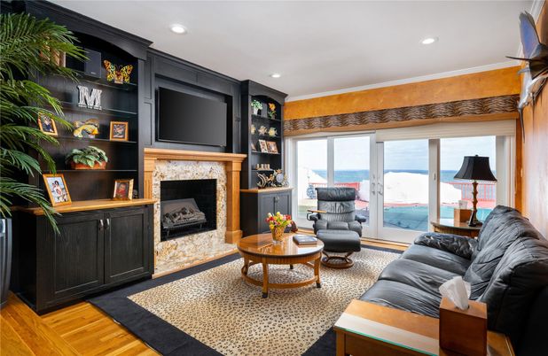 Fireplace, Interior, Living room, Recessed Lighting, Water, Wood Texture Flooring