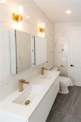 Bathroom, Dual Sink Vanities, Interior, Marble Walls, Recessed Lighting