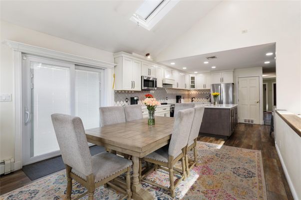 Dining room, Interior, Kitchen, Recessed Lighting, Stainless Steel Appliances, Wood Texture Flooring