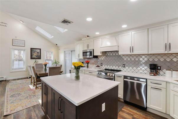 Dining room, Interior, Kitchen, Recessed Lighting, Stainless Steel Appliances, Wood Texture Flooring