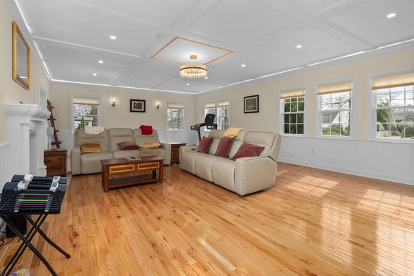 Fireplace, Fitness Equipment, Interior, Living room, Recessed Lighting, Wood Texture Flooring