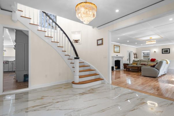 Chandelier, Fireplace, Interior, Living room, Marble, Recessed Lighting, Wood Texture Flooring
