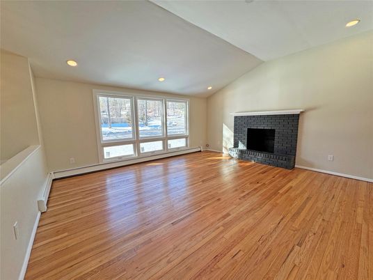 Empty room, Fireplace, Interior, Recessed Lighting, Wood Texture Flooring