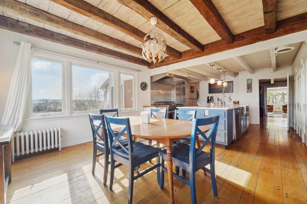 Chandelier, Dining room, Interior, Kitchen, Pendant Lights, Stainless Steel Appliances, Wooden Beams, Wooden Ceilings, Wood Texture Flooring