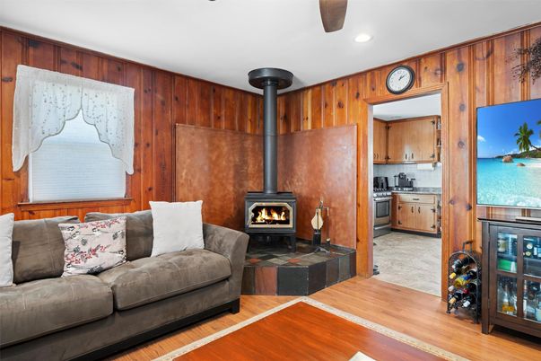 Fireplace, Interior, Kitchen, Living room, Recessed Lighting, Wood Texture Flooring, Wooden Walls