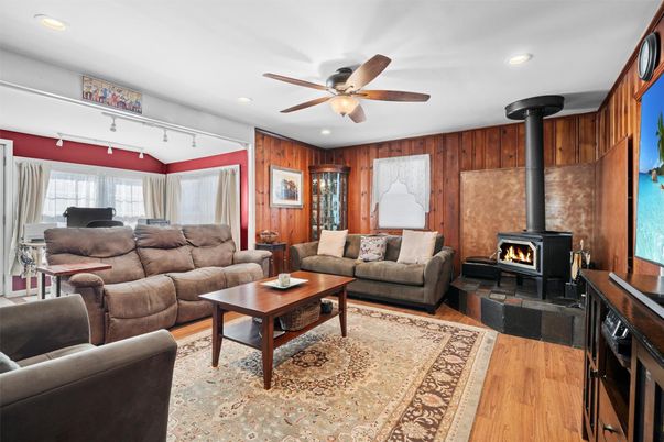 Fireplace, Interior, Living room, Recessed Lighting, Wood Texture Flooring, Wooden Walls