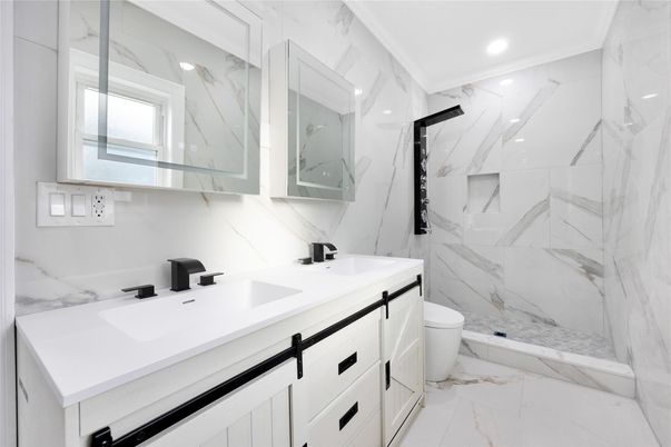 Bathroom, Dual Sink Vanities, Interior, Marble, Marble Walls, Recessed Lighting