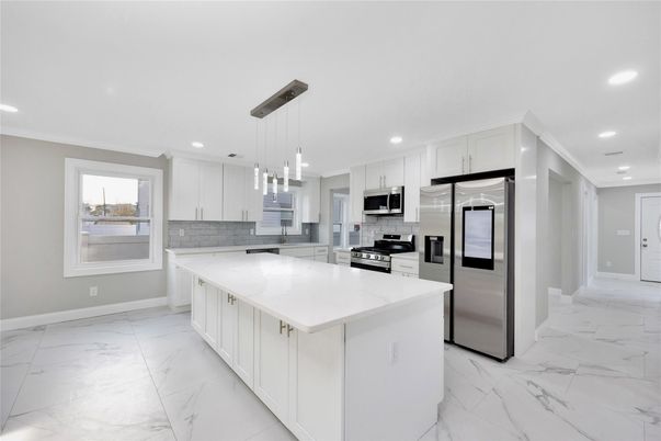 Interior, Kitchen, Marble, Pendant Lights, Recessed Lighting, Stainless Steel Appliances
